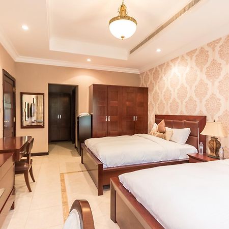 Yanjoon Holiday Homes - Palm Jumeirah Frond A Villas 迪拜 外观 照片